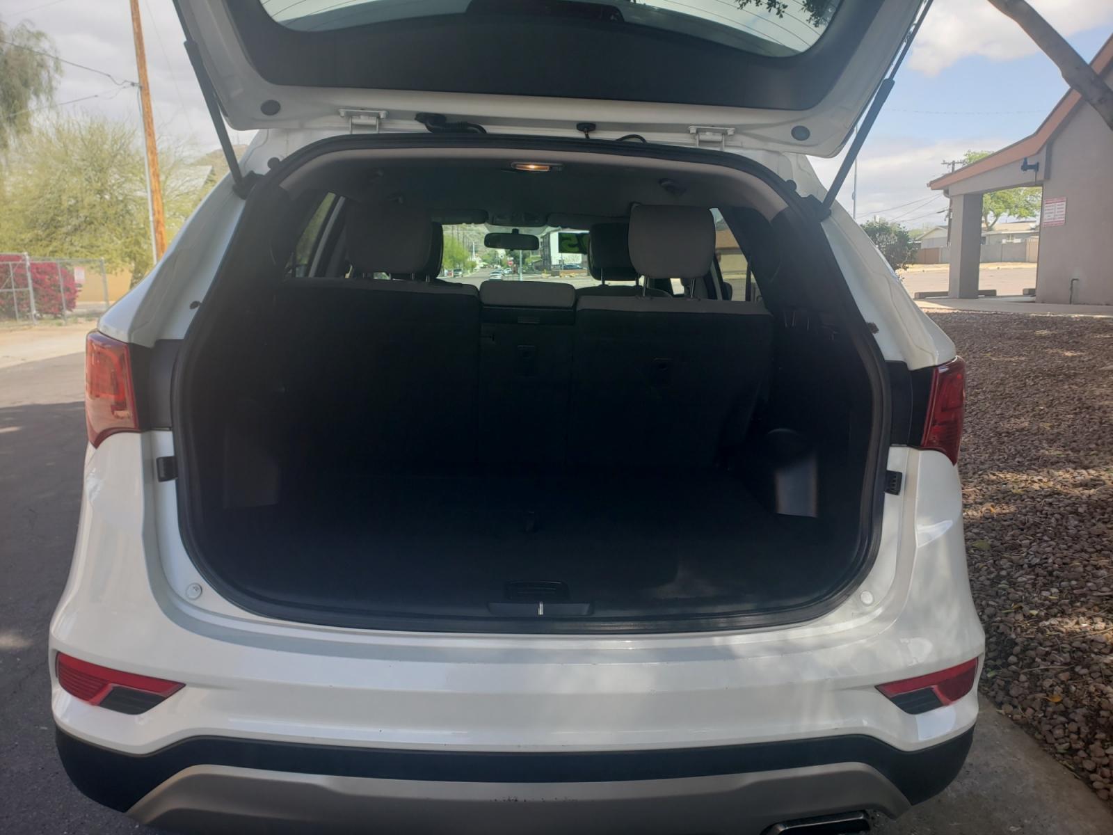 2017 WHITE /gray and black Hyundai Santa Fe SE sport (5NMZT3LB6HH) with an 2.4L L4 DOHC 16V engine, 4-Speed Automatic transmission, located at 323 E Dunlap Ave., Phoenix, AZ, 85020, (602) 331-9000, 33.567677, -112.069000 - 2017 Hyundai Santa Fe Sport,........A Must See!! No accidents, Ice cold AC. The SUV is gorgeous inside and out. Power windows, Power door locks, Touch screen Stereo/CD Player, Phone sync, Bluetooth, Backup camera, Beautiful gray and black interior with gray cloth seats in near perfect condition, Inc - Photo #16